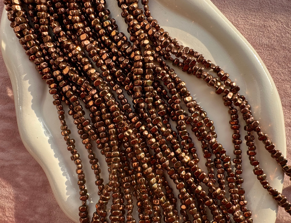 Нить гематитовых бусин 5-6мм, галтовка