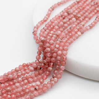 Родохрозит граненый, диаметр около 3-3,2 мм, цена за отрезок 19 см (1/2 нити)