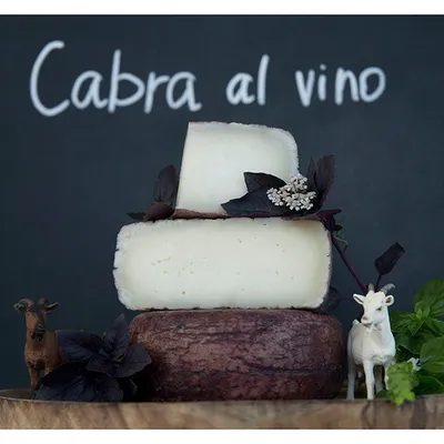 Фотография Козий сыр полутвердый «Пьяная коза» (Cabra Al Vino) / 200 гр купить в магазине Афлора