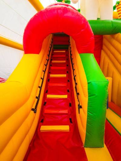 Детский надувной батут-горка "Слоник в джунглях" с прямым скатом 7*5*6 м