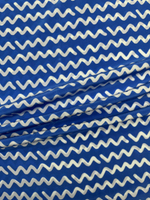 Шелк голубой с белыми узорами