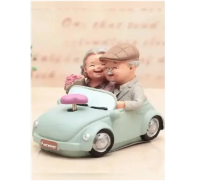 Статуэтка музыкальная "Бабушка и дедушка в авто".
