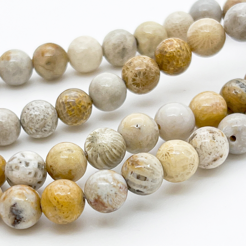 Коралл окаменелый, размер около 8,1-8,3 мм, цена за 22-23 шт (1/2 нити)