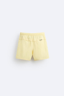 ZARA ПЛАВКИ КЛАССИЧЕСКОГО КРОЯ ИЗ РЕЛЬЕФНОЙ ТКАНИ, ПАСТЕЛЬНО-ЖЕЛТЫЙ