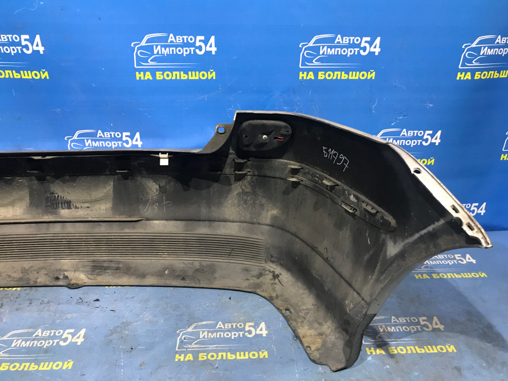 Бампер задний NISSAN TINO 1998-2003