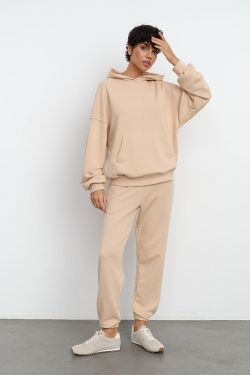 Свободные джоггеры без начеса из премиум футера ванильного цвета