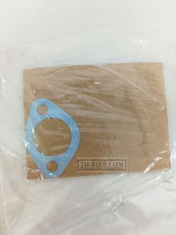 12194-HC5-740. GASKET, TENSIONER HOLE