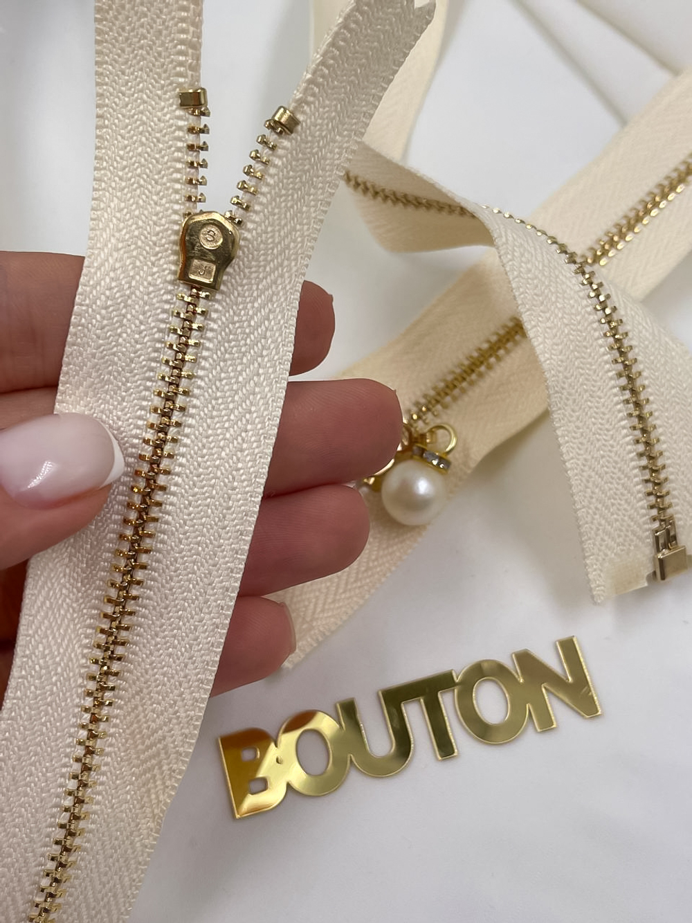 Молния светло-бежевая золото жемчуг