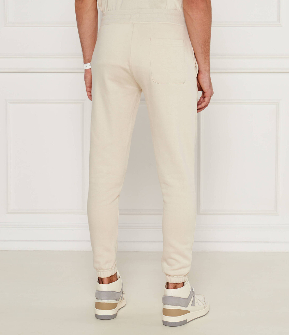 Спортивные штаны Tommy Jeans - кремовый(DM0DM20473)