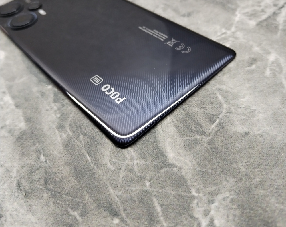 Poco F5 (23049PCD8G) - Задняя крышка (корпус) в сборе со стеклом камеры (ORIG-SP)