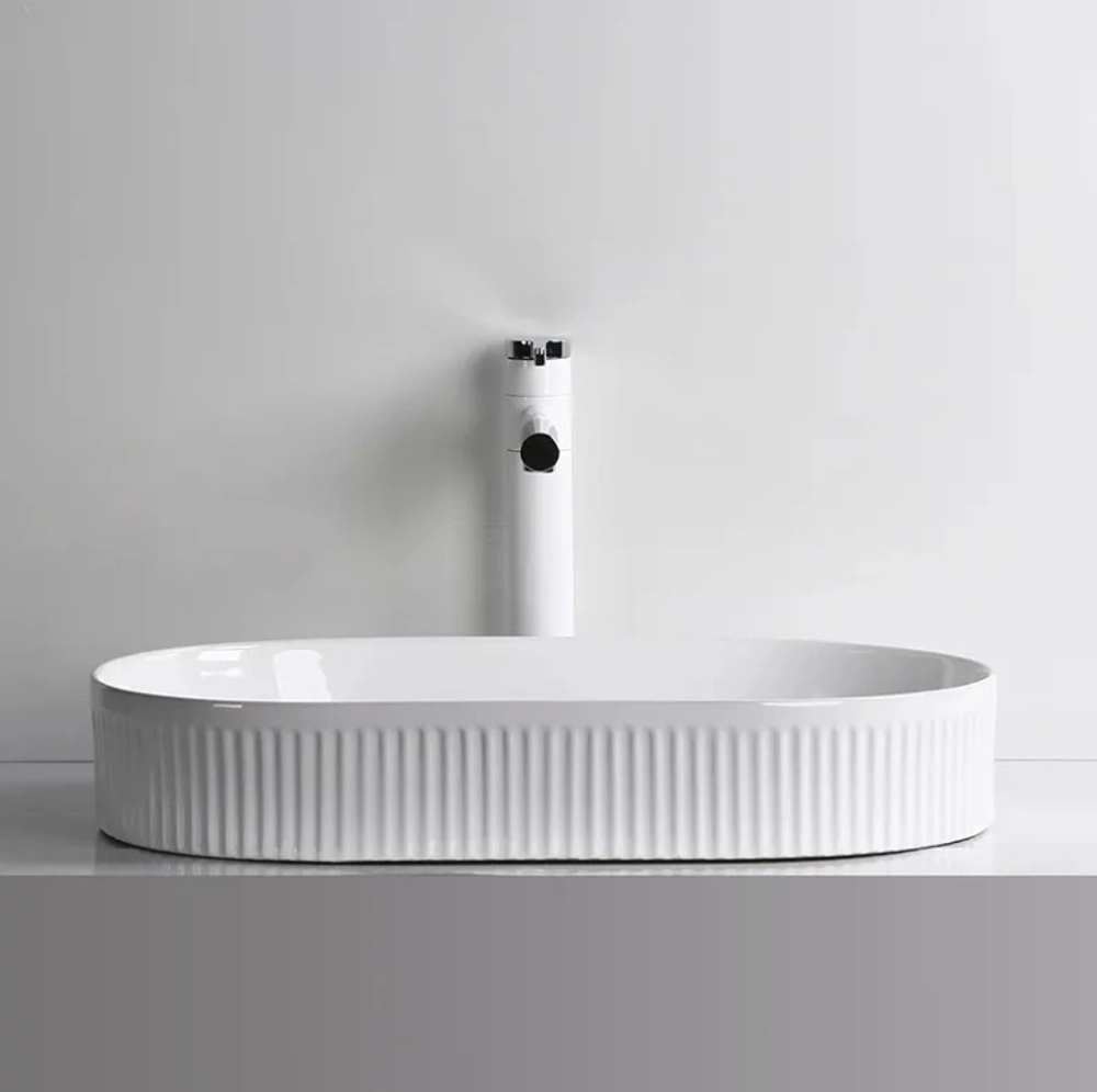 Раковина CR8009 накладная, белая, овальная 580х360х100 Ceruttispa