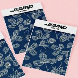 Ткань флис белые узоры клевера утончённые