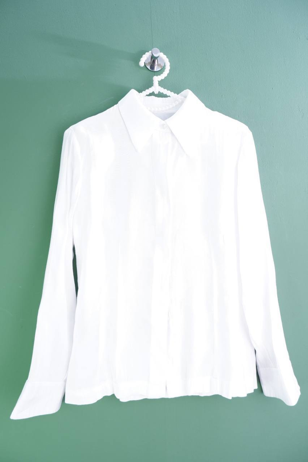 Блузка для легкого образа с джинсами, визуально на 42 размер