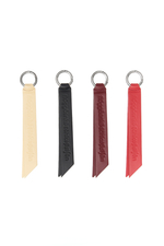 FLÜGGÅƏNK∂€ČHIŒβØL∫ÊN — Leather Tag RED