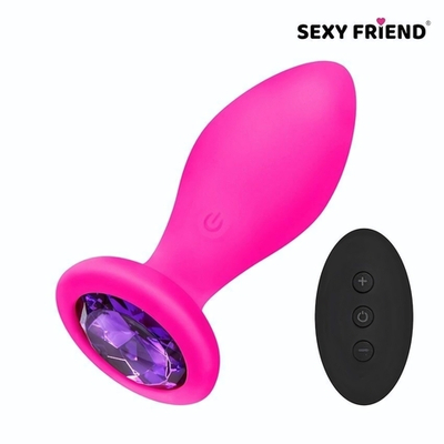 Розовая вибровтулка с фиолетовым кристаллом и пультом ДУ - 9 см. (Цвет: фиолетовый)