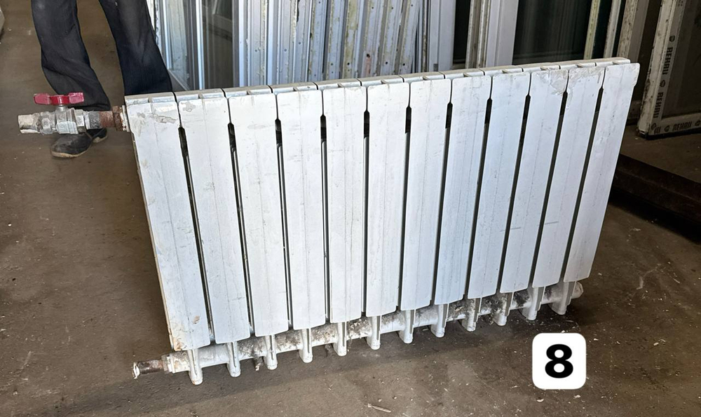 Биметаллический радиатор Б/У 500 12 секц. бок.