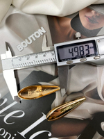 Пуговицы вытянутые в форме капли золотистые