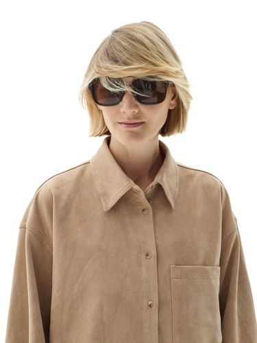 Бежевая рубашка из эко-замши