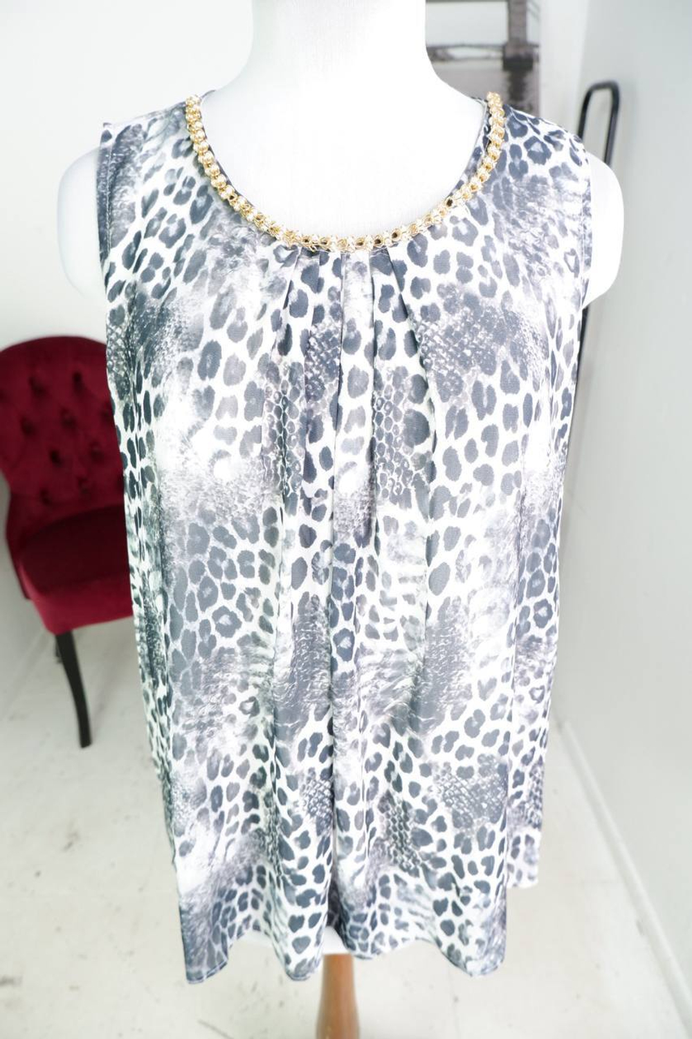 Топ для стильного акцента, маркировка L, визуально на 48 размер