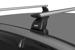 Багажник LUX с крыловидными дугами 1,2м в штатные места с адаптерами под авто.