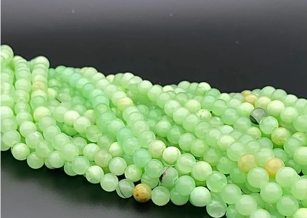 15397-8 Кальцит (оникс) яблочный шар гладкий 8 мм, нить 19см