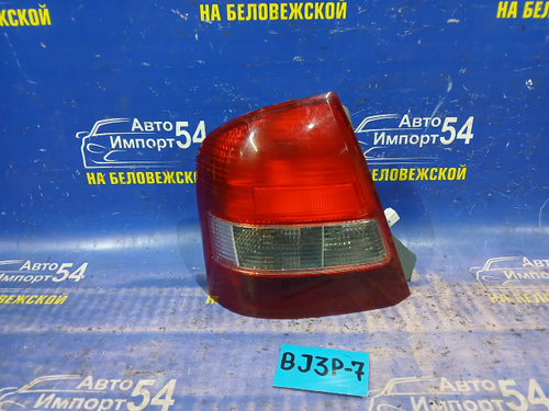 Стоп левый MAZDA FAMILIA 2001