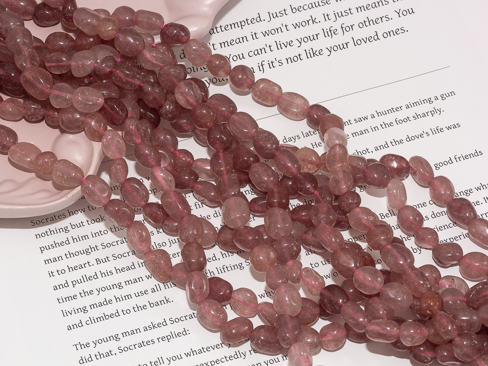 Нить бусин из клубничного кварца 7х9мм (галтовка)