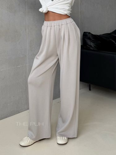 Бежевые женские брюки прямого кроя