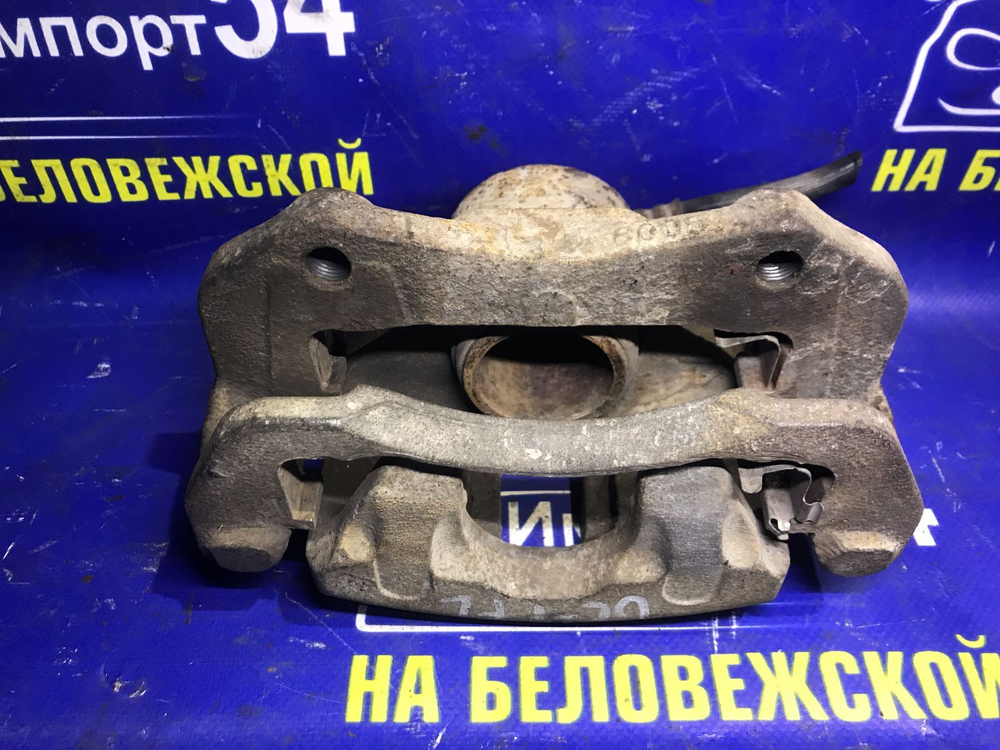 Суппорт тормозной передний левый ISUZU RODEO 1994