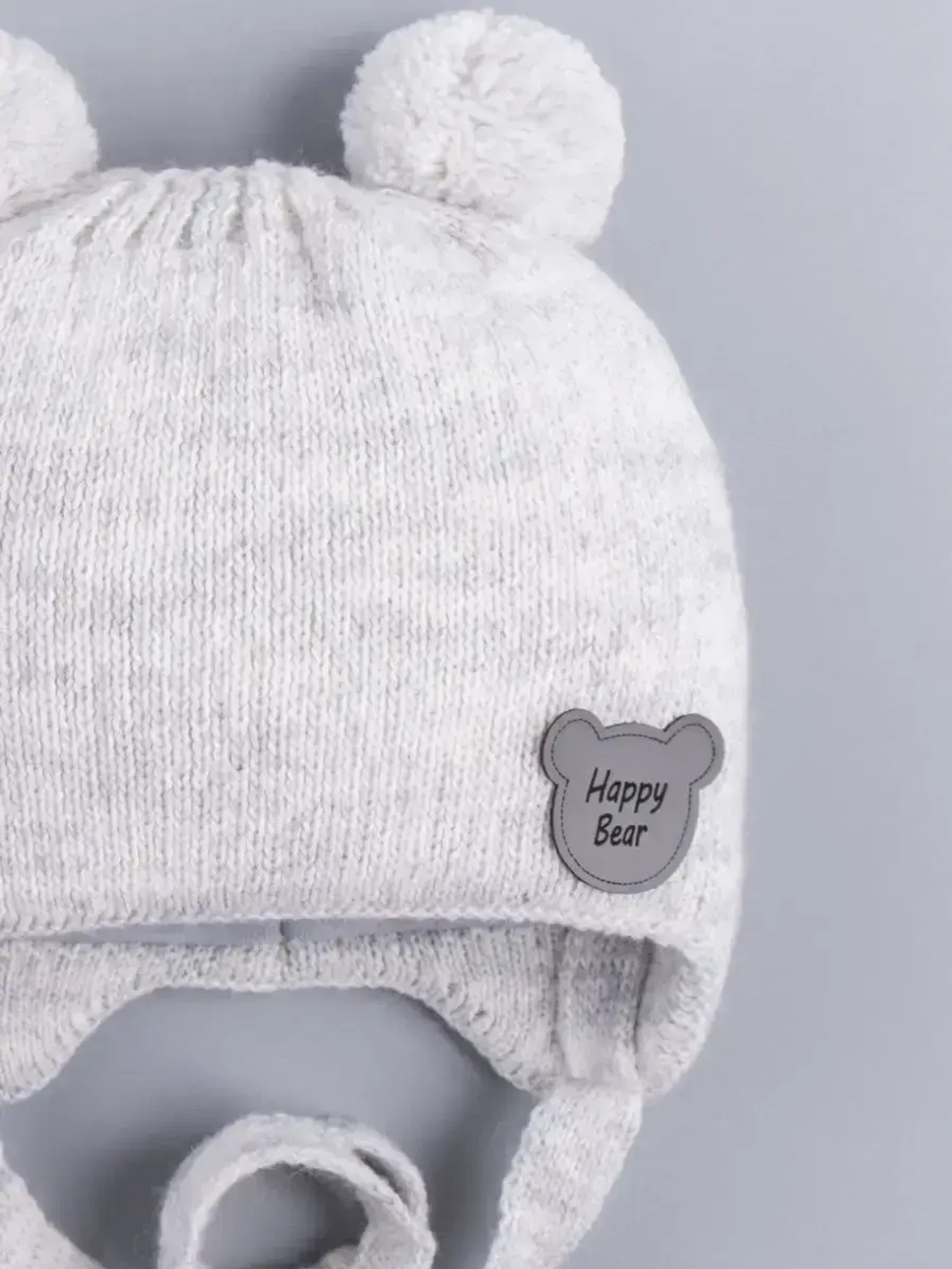 Шапка детская осенняя с завязками и помпонами