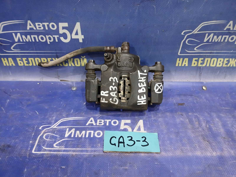 Суппорт тормозной передний правый Honda LOGO 1997
