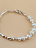 Жемчужный браслет с серебряной дугой