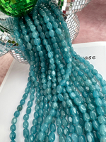 Нить бусин из тонированного кварца 7-8мм (галтовка)