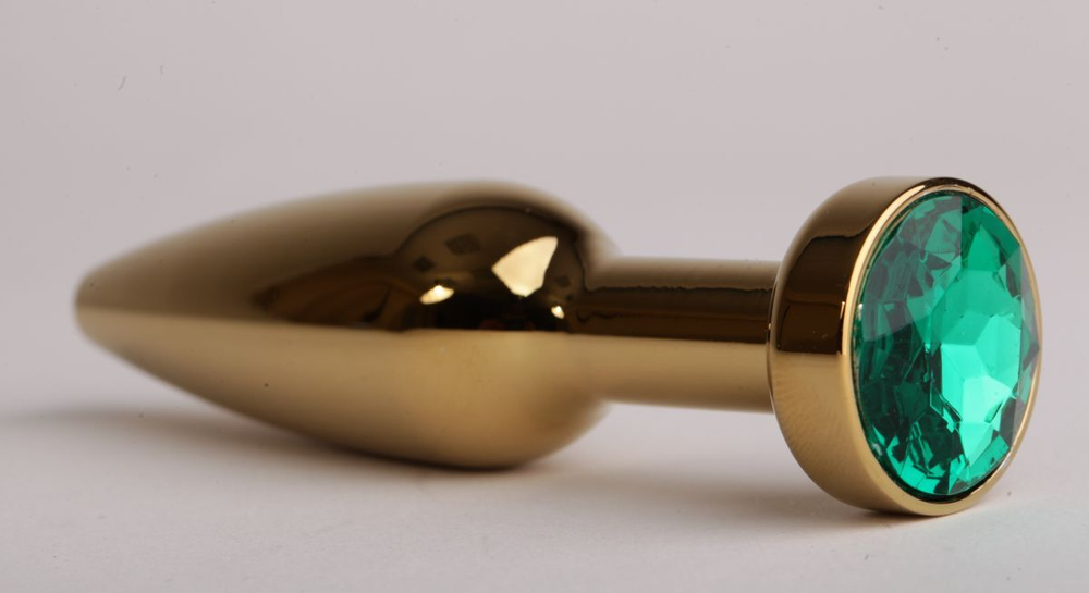 Золотистая анальная пробка с зеленым кристаллом - 11,2 см. (Цвет: зеленый)