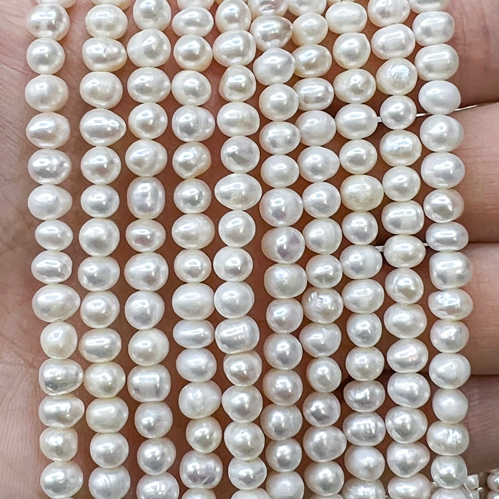 Жемчуг 2А речной бусины 4-5 мм, на нитке 38 см