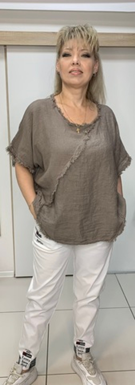 Туника с вывернутыми швами и бахромой