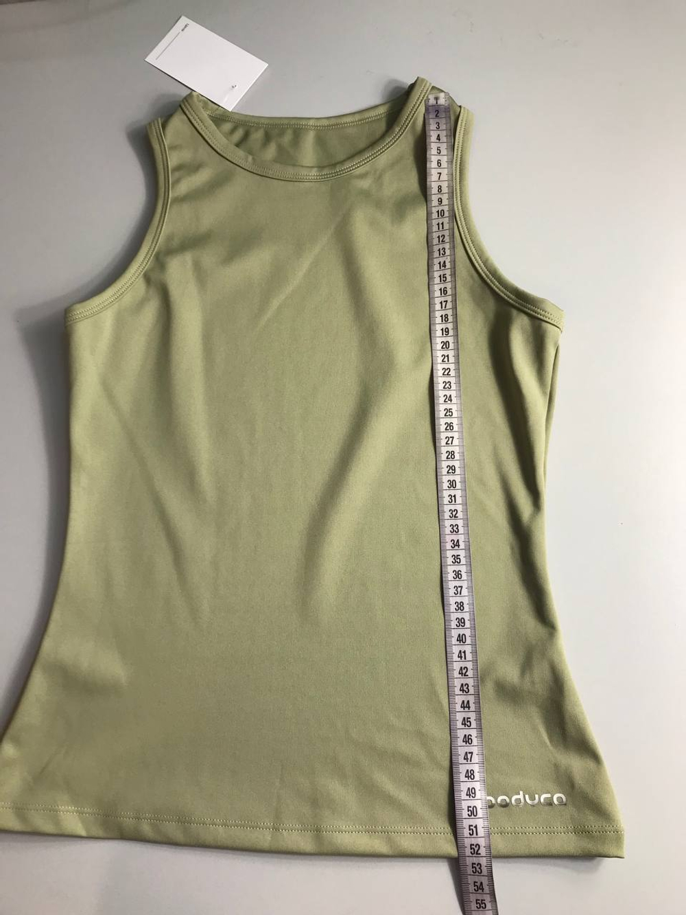 Топ обтягивающего кроя, маркировка S, визуально на 44 размер