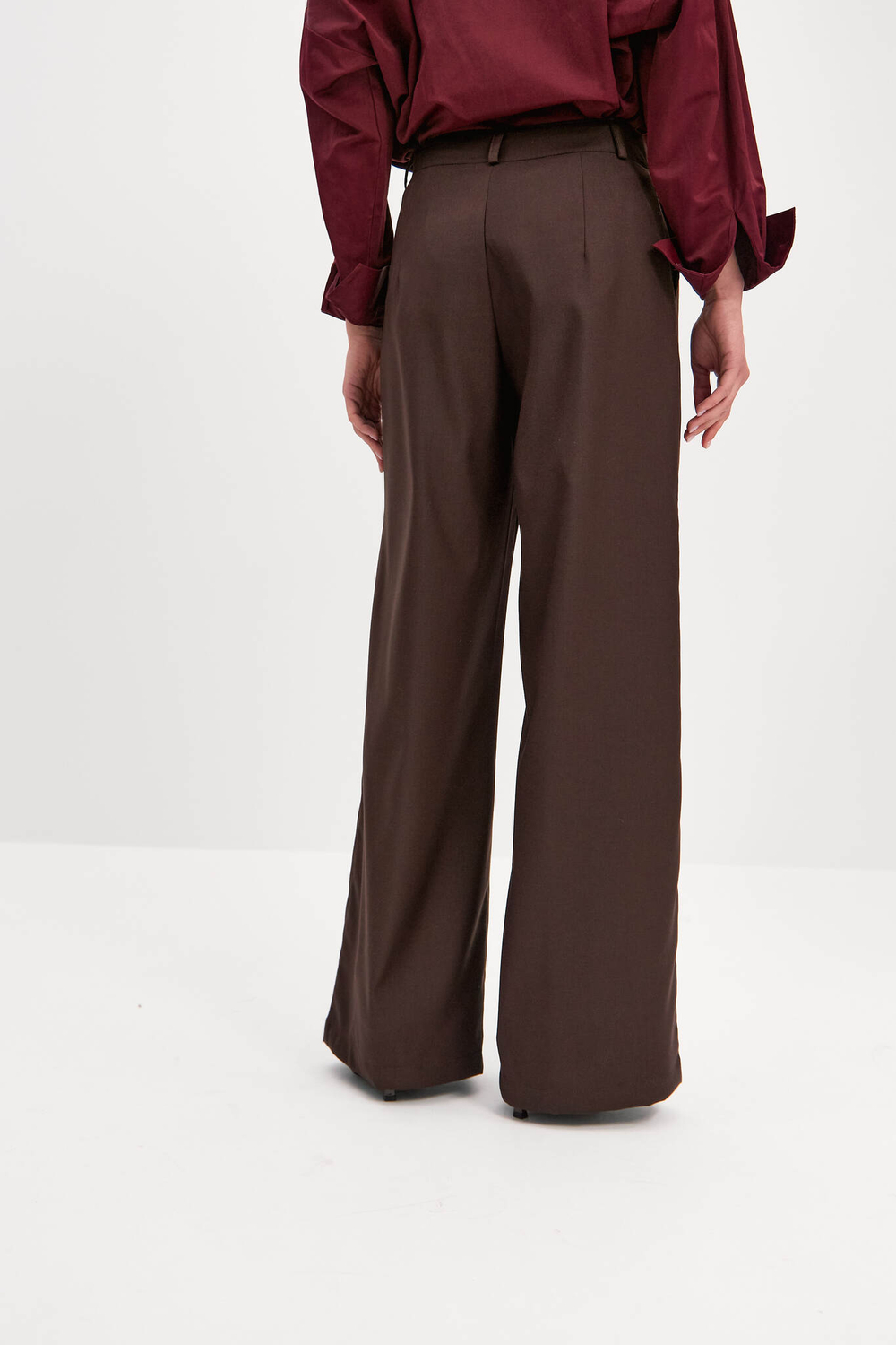 Брюки с защипами