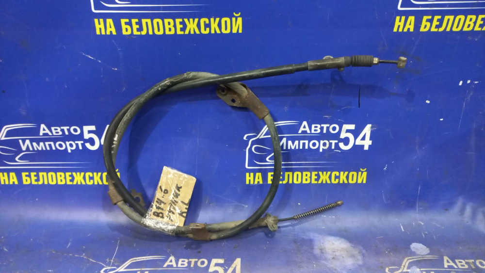 Трос ручника левый NISSAN SUNNY 1998