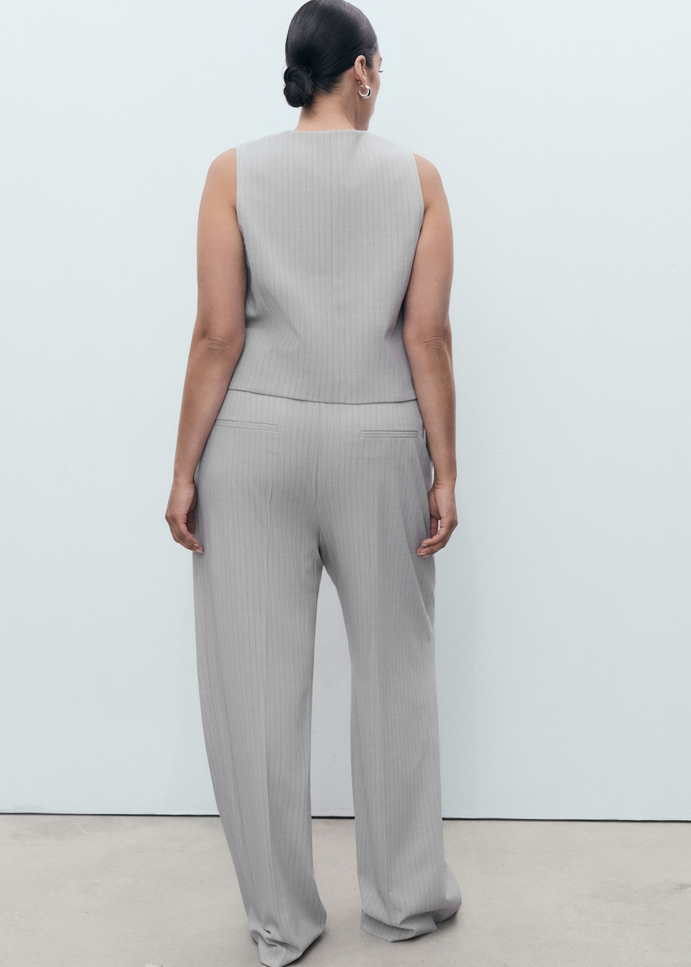 Костюмные брюки в узкую полоску