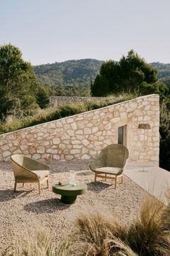 Кресло Olbia из искусственного ротанга и массива тика La Forma Испания