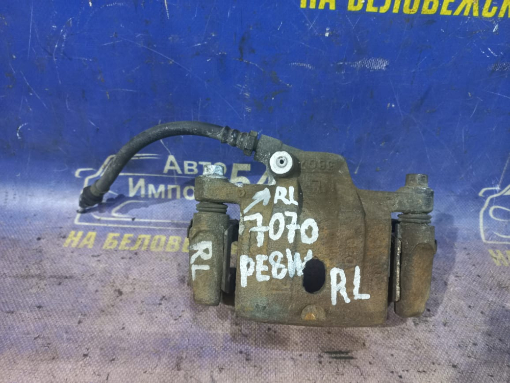 Суппорт тормозной задний левый MITSUBISHI DELICA 1997-2007