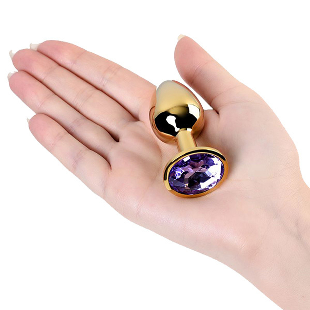 Золотистая коническая анальная пробка 7см с фиолетовым кристаллом ToyFa Metal 717004-15