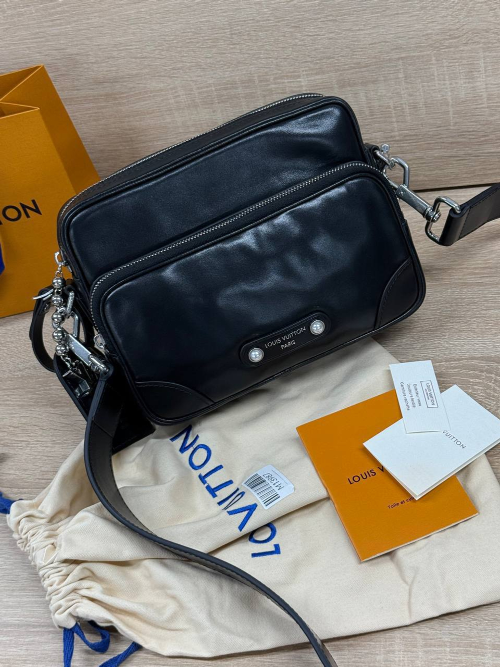 Сумка-мессенджер Louis Vuitton