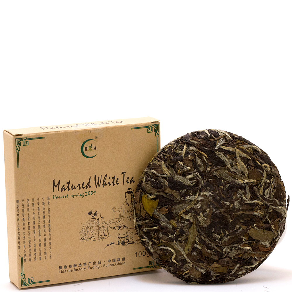 1035к Чай прессованный белый "ЛиДа, Бай Му Дань" Состаренный 2009г (мини бин, 100гр)