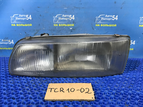Фара передняя левая TOYOTA ESTIMA 1999