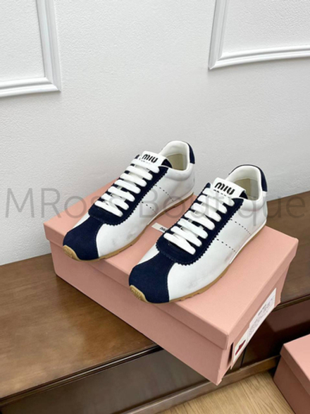 Женские кеды Miu Miu в черно-белом цвете с логотипом