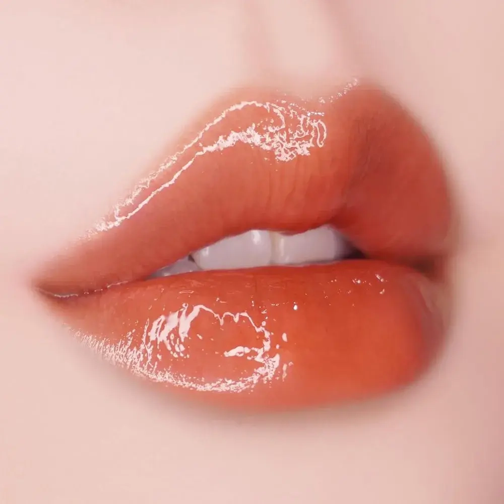 UNLEASHIA Sisua Popcorn Syrup Lip Plumper - Блеск-плампер для губ