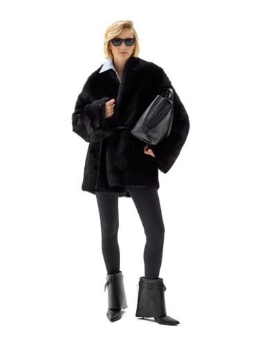 Черная двусторонняя шуба из овчины с поясом