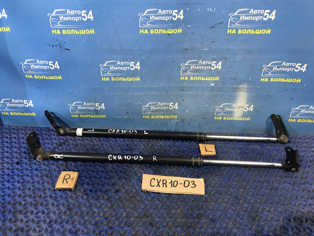 Амортизатор задней двери левый TOYOTA ESTIMA 1998